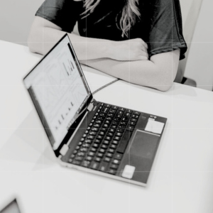 Close-up of a business advisor viewing financial analytics on a laptop, representing Trekk Advisory’s focus on data-driven tax consultancy.