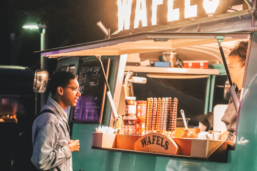 Customer ordering at a small food truck business