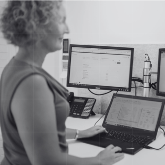 An accountant checking a cashflow plan and strategising financial solutions to improve profitability and long-term stability.