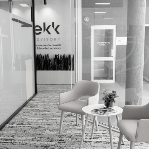 Empty meeting room at Trekk Brisbane office ready for client consultations.