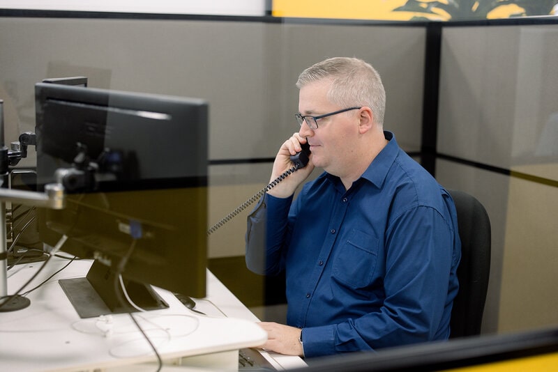 David Roberston of Trekk Advisory Brisbane talks to a client about the focus of ATO this tax time on the phone.