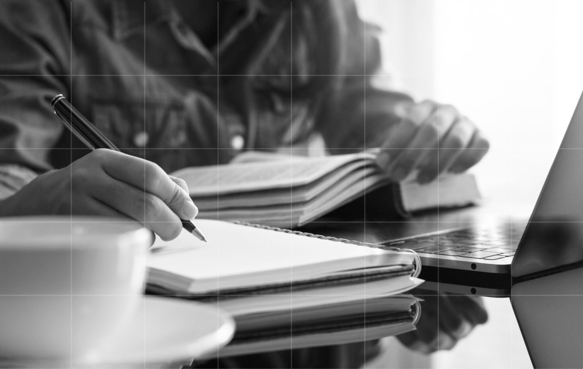 Professional reviewing study materials and notes for self-education expenses that may be tax deductible.